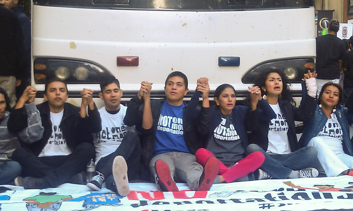 Undocumented immigrant activists block deportation bus